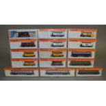 N Gauge. A boxed Arnold 5501 0-6-0 Locomotive together with 4 boxed Coaches and ten pieces of