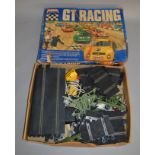 A boxed Scalextric #50 Motor Racing Set containing two cars, throttles and track together wiith
