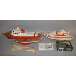 2 remote control boats; Samson 2* which is approx 90cm in length which comes with a stand and