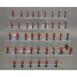 42 unboxed 'Gunner' metal soldier figures by Blenheim, hand painted with red coats, blue trousers