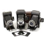 Three Kinax Folding Roll Film Cameras. Including a Super Kinax model (condition 4/5F) and a Kinax