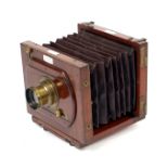 An Early Lancaster Instantograph Half Plate Camera. (condition 5F) with Rectigraph lens. Uncommon