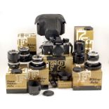 Extensive Nikon F2 Photomic Outfit. Comprising F2 body #7234129 (condition 5F) in maker's box,