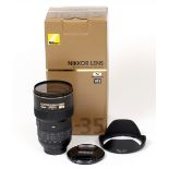 AF-S Nikkor 16-35mm f4 G ED VR Lens. (condition 4E). With UV filter, caps and hood, in makers