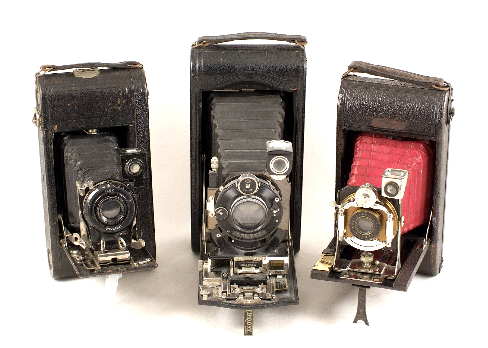 Three Folding Roll Film Cameras, One with Clockwork Motor Wind. To include a Ansco Semi Automatic,