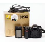 Nikon D200 Digital SLR in Makers Box. (tested & working, condition 4E) with battery, charger and a