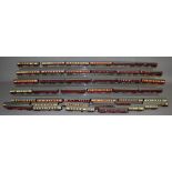 OO Gauge. 43 unboxed Coaches by Bachmann, Mainline etc. in mostly red, red/cream liveries. (43)