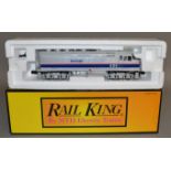 O Gauge. A boxed Rail King F40PH Amtrak Diesel Locomotive.