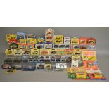 65 diecast boxed models by; Lledo, Oxford, Dinky Atlas etc, this lot also includes 4 Dinky magazines