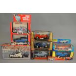 8 diecast models a mixture of 1:24,1:5 scale etc, this lot also includes a Formula 1 friction