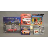 2 model kits by Revell, Airfix etc, also included in this lot is boxed diecast, 3D puzzle and a coin