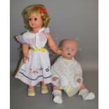 2 vintage unboxed dolls including a girl doll, 'Made in Italy' on back and with recessed wheels on