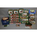 18 Eddie Stobart diecast models along with 2 figurines, 1 is by Wade Ceramics and is limited edition