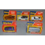 5 boxed Dinky Toys including a scarce version of the #289 Routemaster Bus with silver paintwork