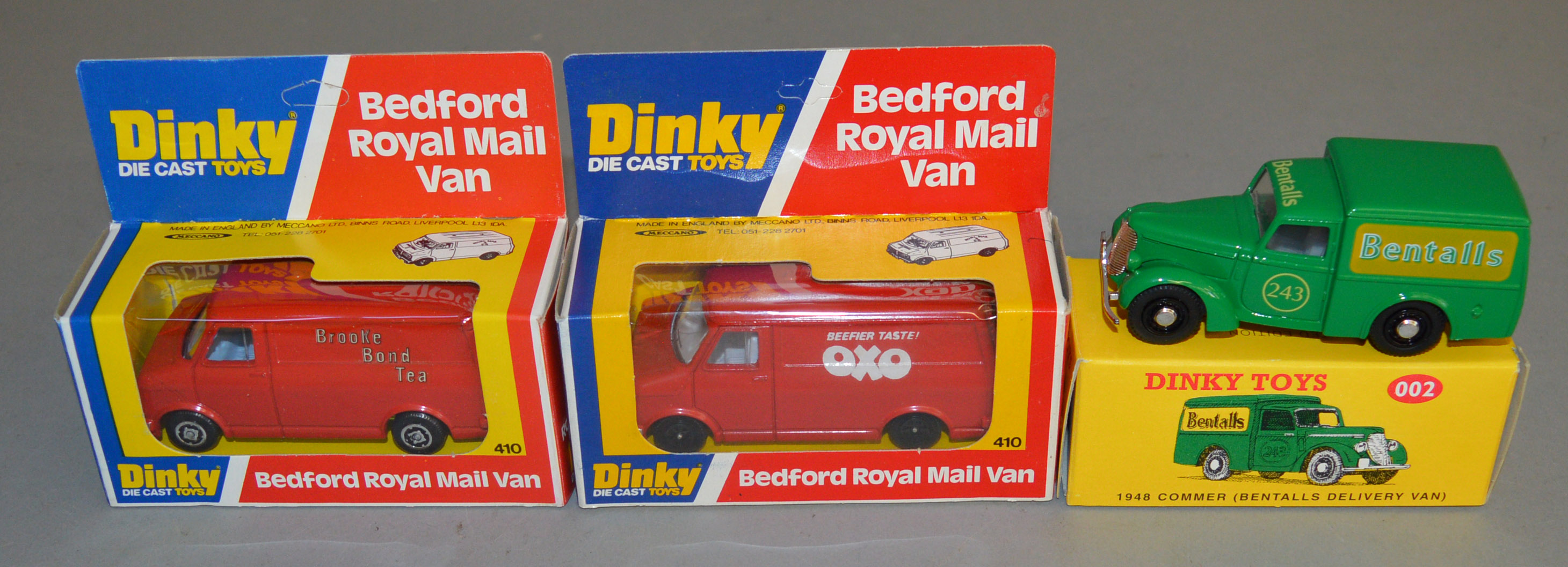 2 boxed Dinky Toys 410 red Bedford Vans, produced for John Gay, with 'Brooke Bond Tea' and 'Oxo'