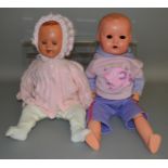 2 unboxed vintage dolls, a composition girl doll and an early vinyl boy doll, approximately 60cm and
