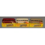 3 boxed Dinky Toys 281 Luxury Coach models - Maroon with cream flashes and red hubs, Fawn with