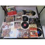 Red record box of pop and rock n roll LP vinyl records including The Monkees RD 7844, The Mamas