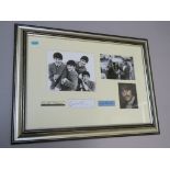The Beatles autographs in frame including signatures by John Lennon, Paul McCartney, George Harrison