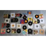 Elvis Presley 25 rare 7 inch singles including promos Japanese, Mexican, English and other rare