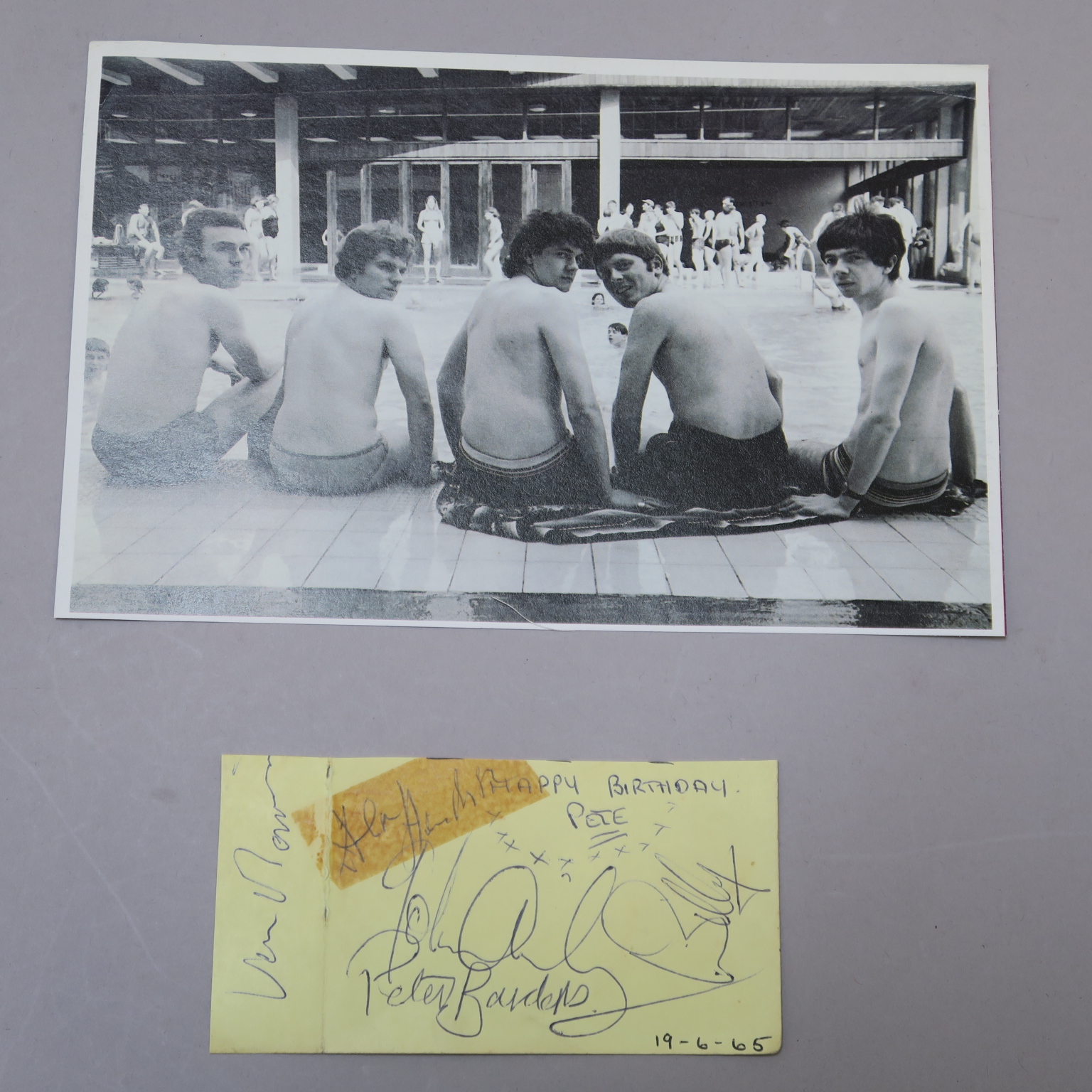 Van Morrison and band ''Them'' signatures on yellow autograph card dated 19/6/1965 following the