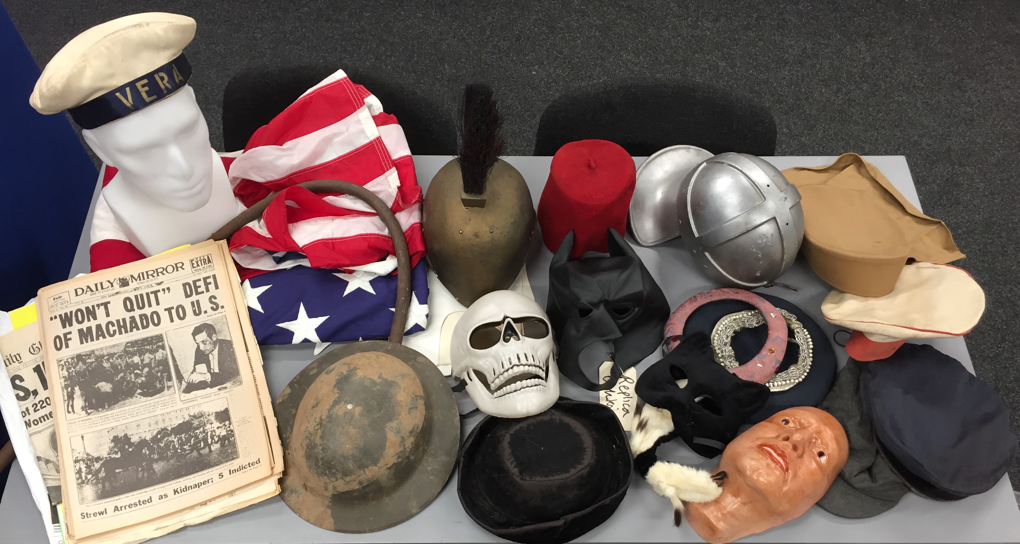 Ex-studio large collection of film prop helmets, hats, masks, belts, wigs, shoes, American flags,