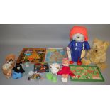 A good mixed lot of vintage toys including two bears, one dressed as 'Paddington' carrying a vintage