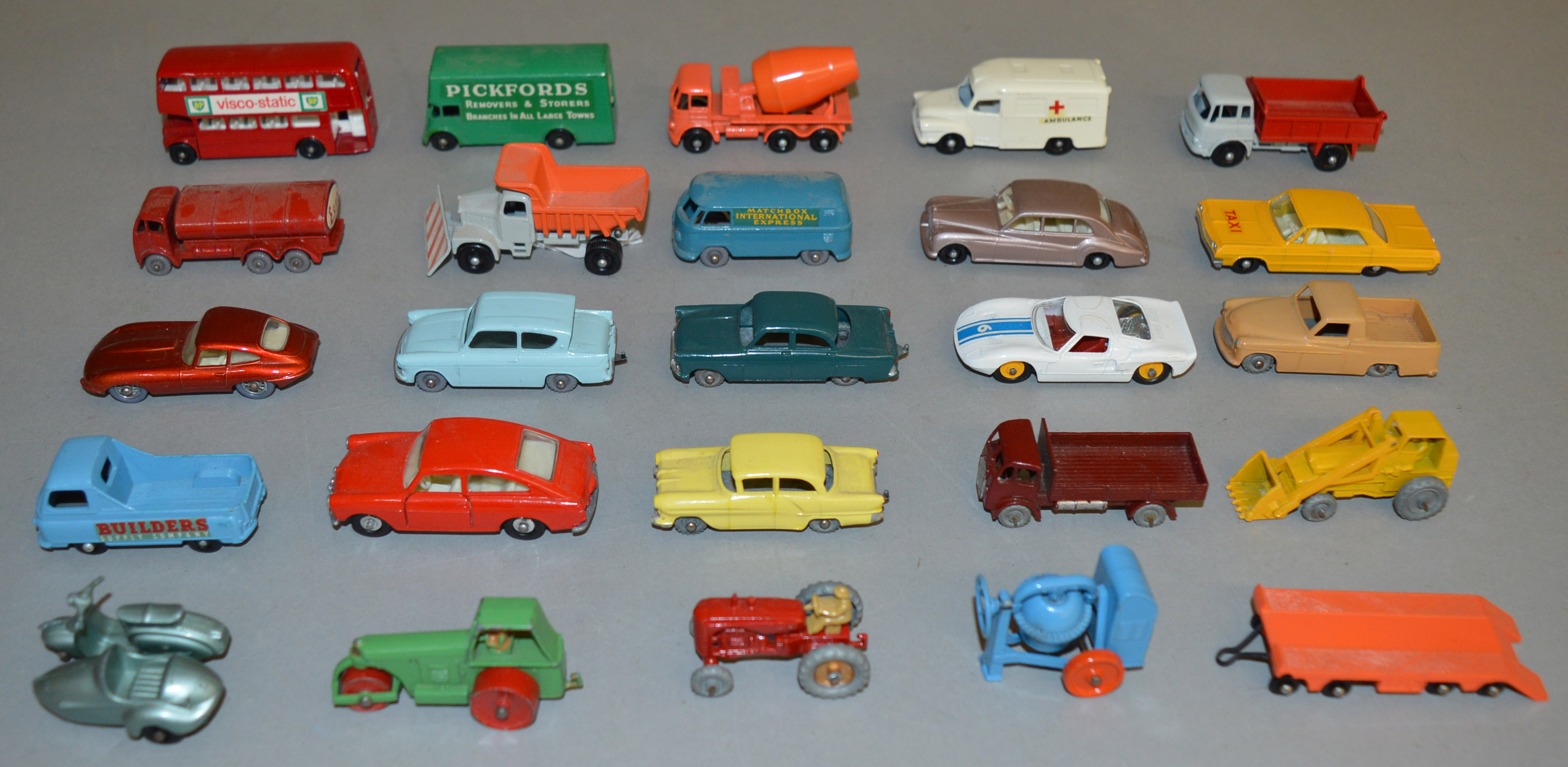 25 unboxed Regular Wheel models from the Matchbox 1-75 series including 7b Ford Anglia, 11b Esso