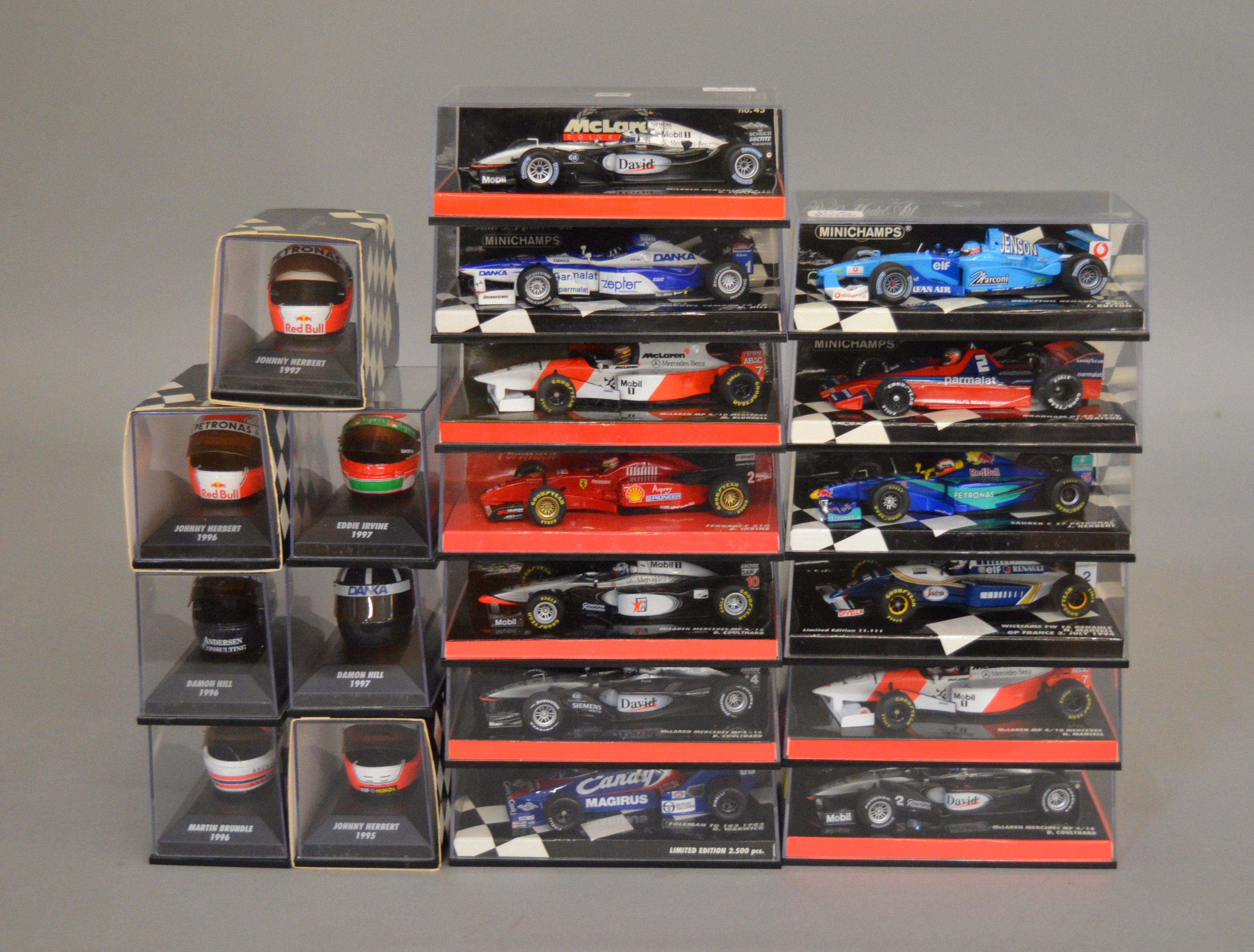 20 boxed diecast models by Minichamps, 13 Formula 1 models and 7 helmets  (20).