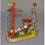 A vintage tinplate clockwork performing Elephant, with fixed key, marked 'Made in U.S. Zone' and
