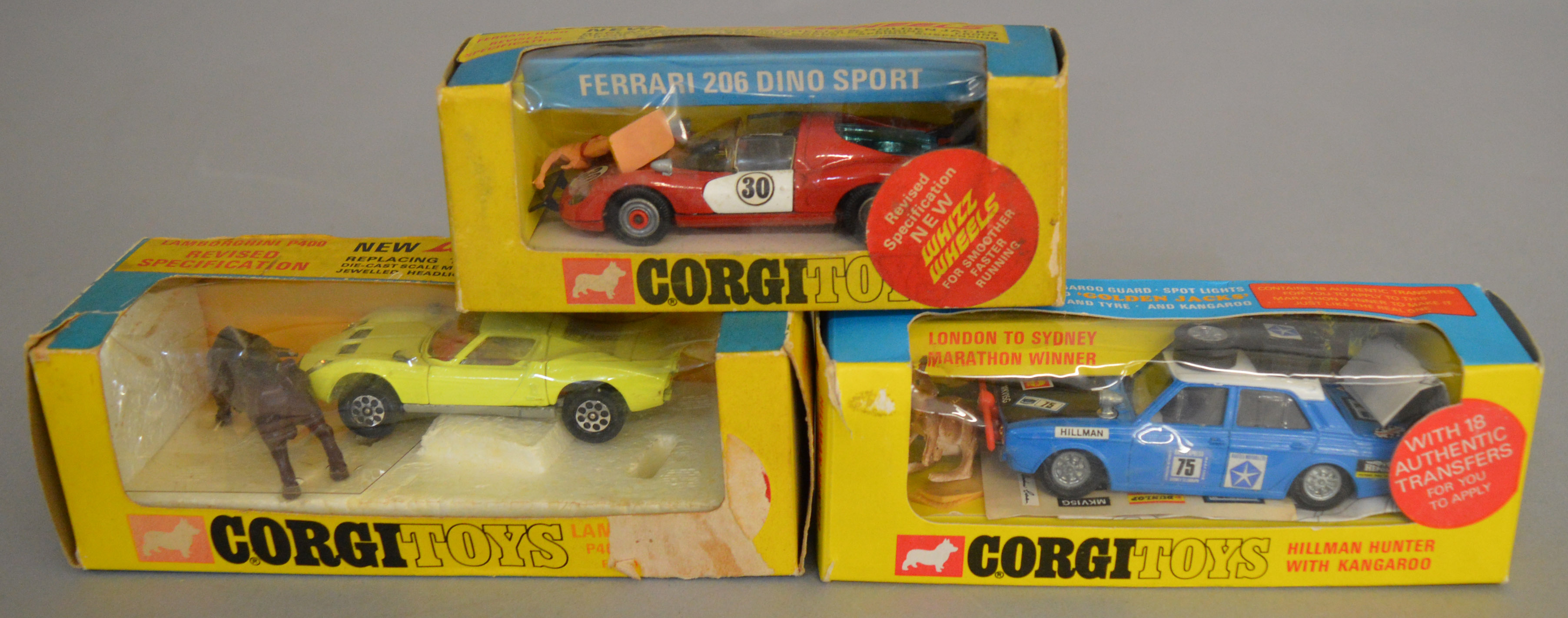 3 Corgi Toys, 302 Hillman Hunter, 342 Lamborghini P400 GT Miura and 344 Ferrari 206 Dino Sport,