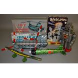 3 Tinplate Toys including a HaHa Toy (China)  'Smoking Space Man', a Leadworks 'Zero Fighter'