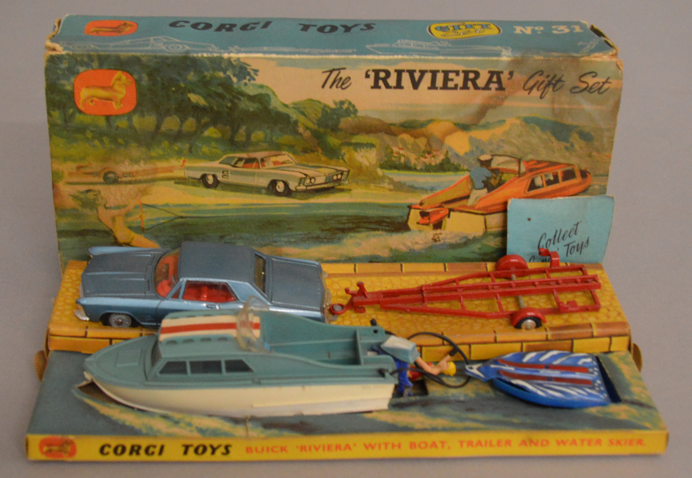 A Corgi Toys No. 31 'The Riviera Gift Set' containing Buick Riviera and Brooklands Trailer, VG, with