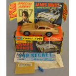 A Corgi Toys 261 James Bond 007 Aston Martin DB5, G/G+ in a generally G+ box and plinth with