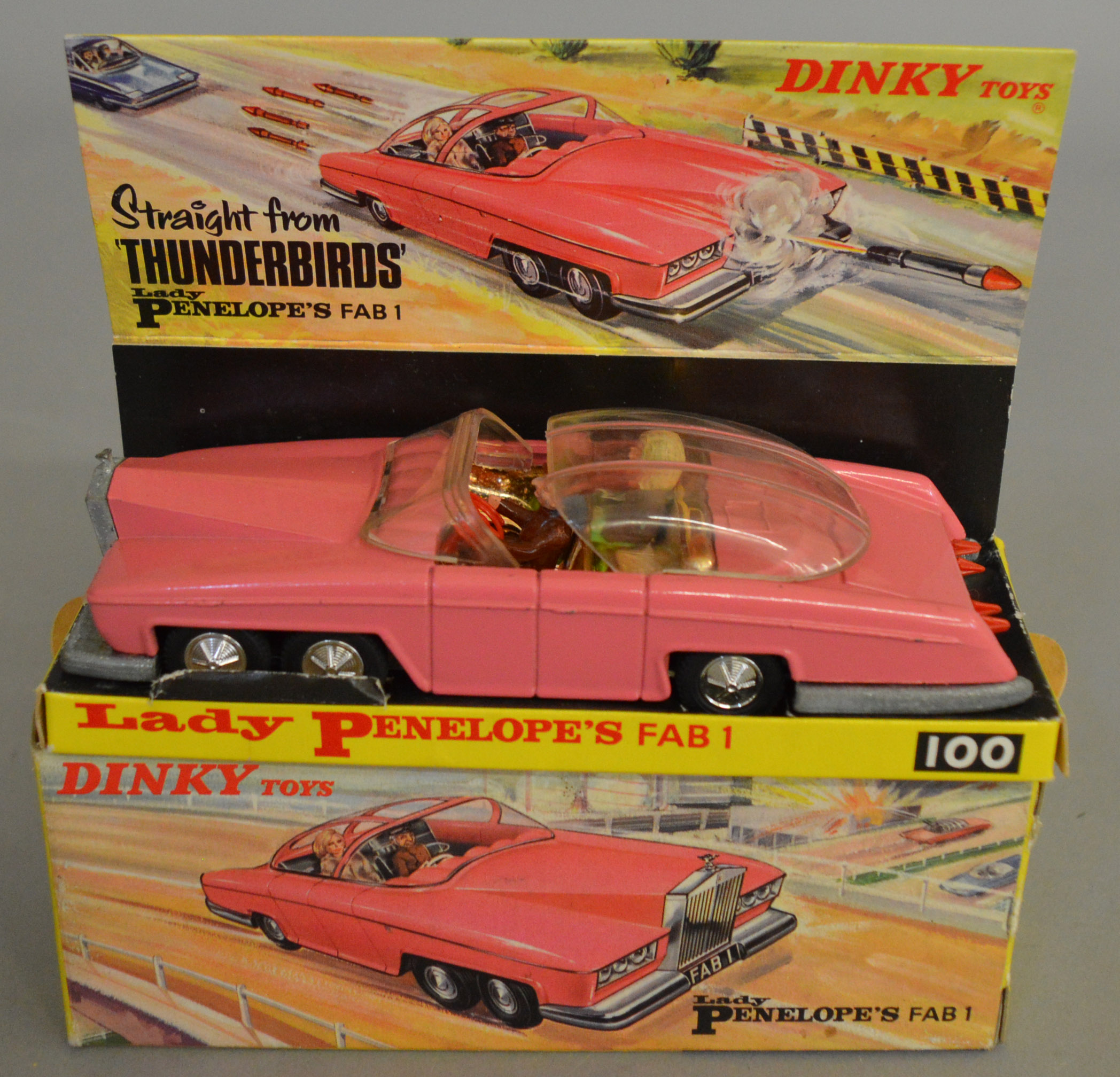 A Dinky Toys 100 Lady Penelope's FAB 1, containing Parker and Lady Penelope figures, with four