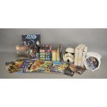 Star Wars mixed lot which includes; Stormtrooper helmet, 7 plates, cards, comics, Jigsaws by Parker,