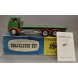 A boxed Shackleton mechanical Foden FG six wheel Flatbed Lorry in green with red mudguards,