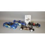 2 gas powered cars along with 2 Subaru bodies (2)