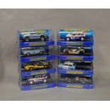 8 boxed Scalextric slot cars, which includes; #C3408 MG Metro 6R4, C2974 Ferrari 308 GTB etc (8)