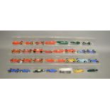 28 unboxed race car slot cars by Scalextric, all vary in condition some are incomplete this lot