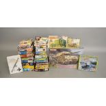 28 boxed plastic model Military related  kits by Matchbox, Italeri, Dragon and others, in various