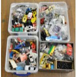 A very large quantity of slot car accessories which includes; car bodies, wheels etc, this lot is