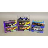 7 boxed slot rally/ F1 cars by Scalextric, which includes; #C3261 Lotus F1 team, #C2561 Peugeot
