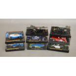 8 boxed Scalextric slot cars, which includes; #C129 March Ford, #C137 Ligier JS11 etc (8)