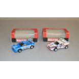 2 Spanish Scalextric cars, both different variations of the  Lancia Rally 037 together with two