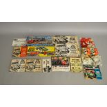 A group of vintage boxed and bagged Airix Motor Racing Accessories including Starter Unitts,