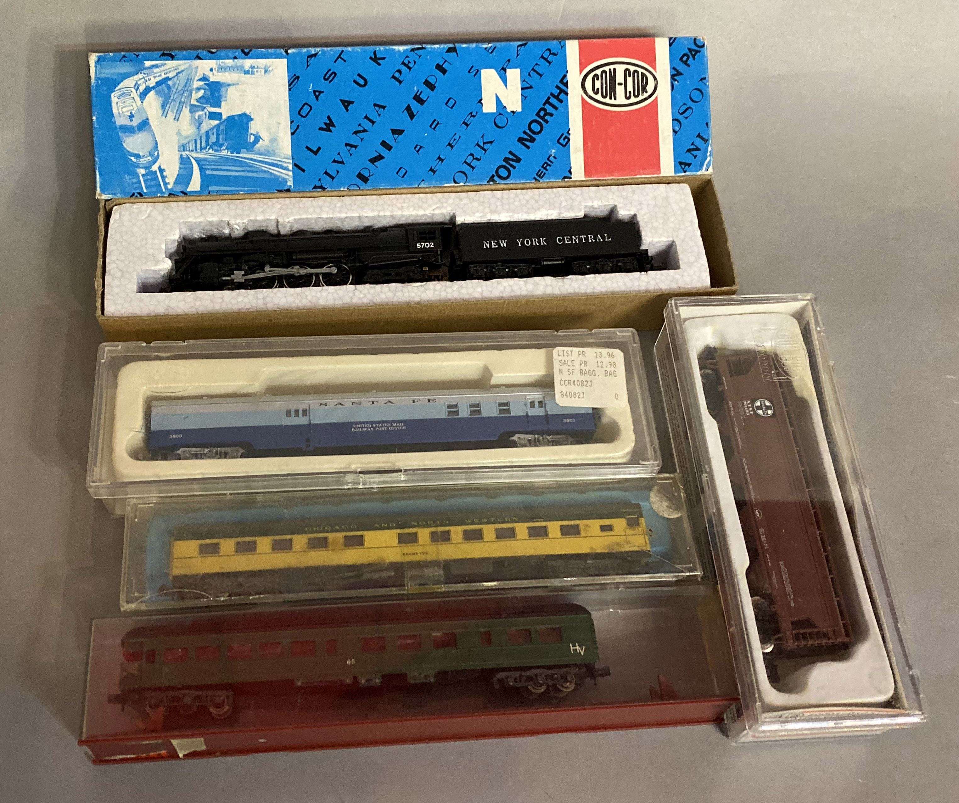 Ex-Shop Stock N gauge  Con-Cur x5 which includes; 5702 black Locomotive and x4 coaches (5).