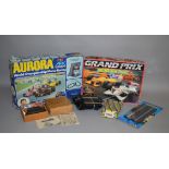 A mixed selection of Slot Car related items including a boxed Scalextric Grand Prix set,  a carded