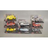 8 boxed Carrera Evolution slot car models in 1:32 scale,  two being from James Bond 007 range -