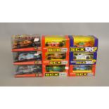 9 boxed slot car models by SCX, which includes; Mazda 787 #93160, Ferrari F-1 #8372.09  etc(9).